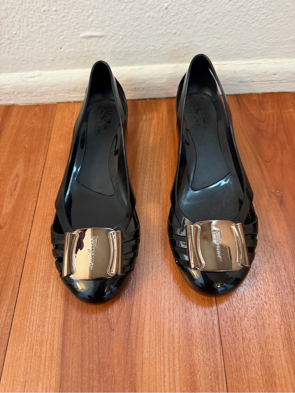 Salvatore Ferragamo Black Patent Jelly Flats with Metallic Bow Accent